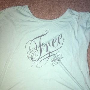 A mint green shirt 💚